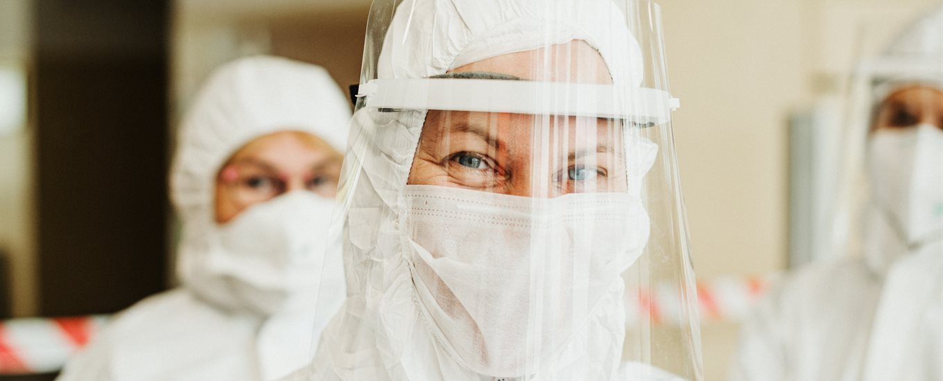 Care worker in a face visor